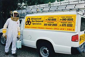 Maricopa County bee removal service truck and employee